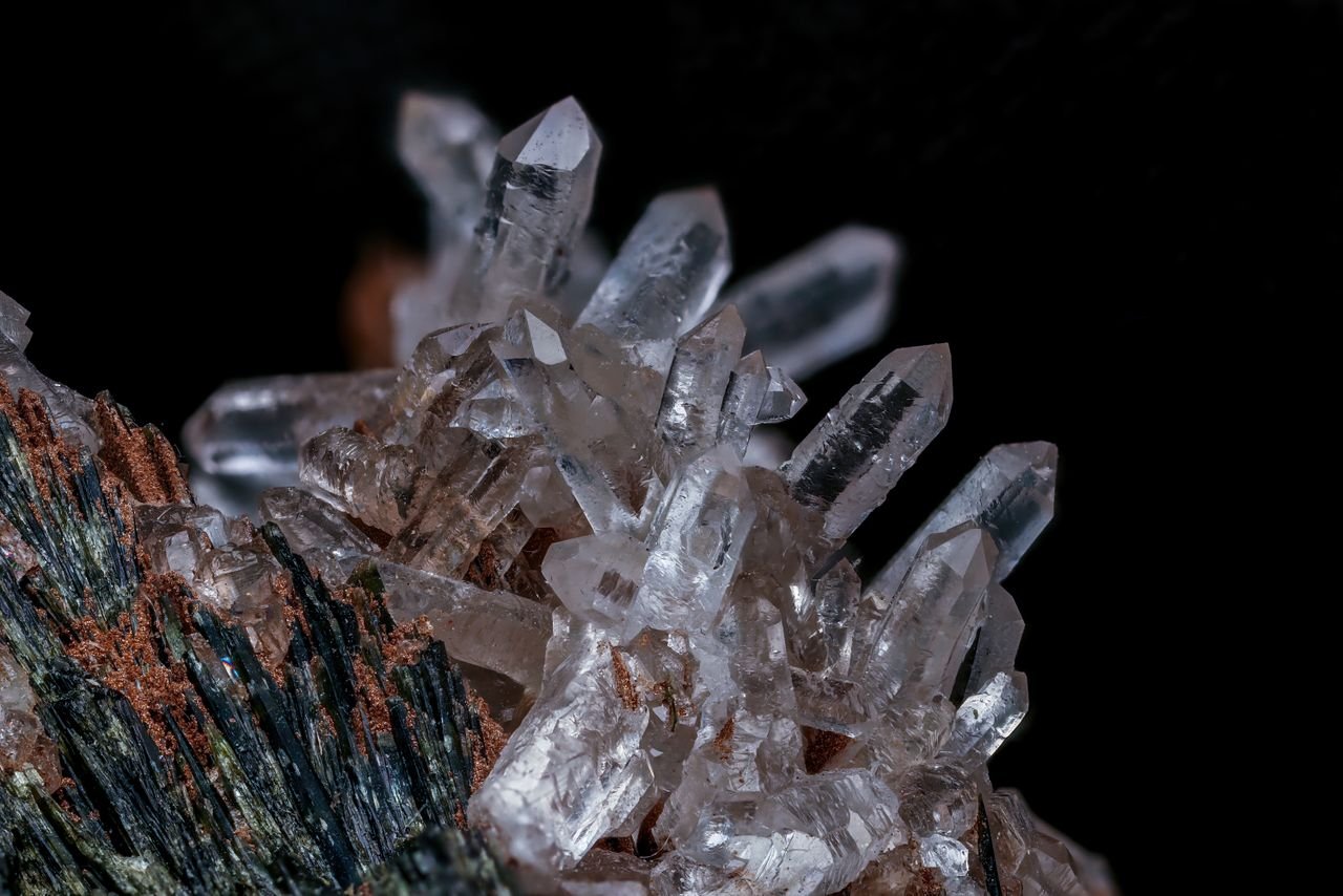 Home Detailed macro shot of a clear quartz crystal cluster showcasing natural mineral beauty.