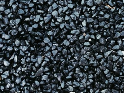 Home High-resolution close-up of dark gravel texture, ideal for backgrounds and design projects.