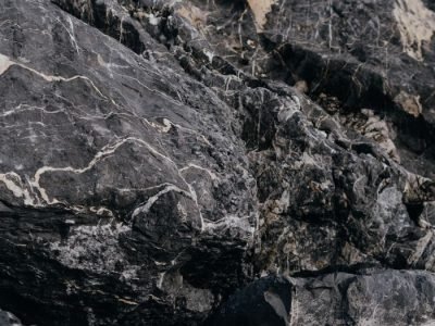 Home High-resolution close-up of textured gray rocks, showcasing natural patterns and rugged beauty.