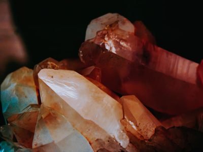 Home A vivid close-up shot of natural shining crystal formations displaying intricate textures and colors.