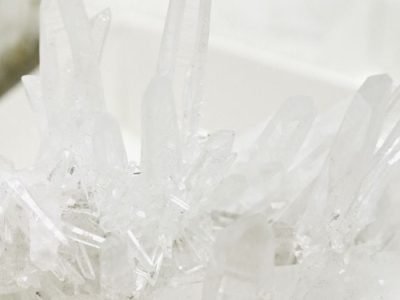 Home Detailed view of a natural quartz crystal cluster showcasing its clarity and structure.